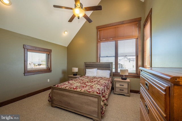 carpeted bedroom featuring ceiling fan and lofted ceiling