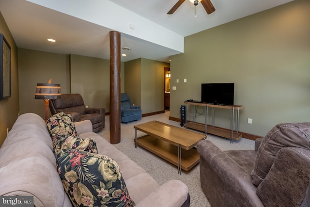 living room with ceiling fan and light colored carpet