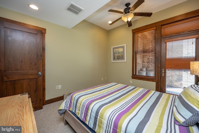 bedroom featuring ceiling fan and light colored carpet