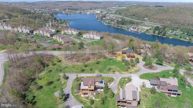 drone / aerial view with a water view