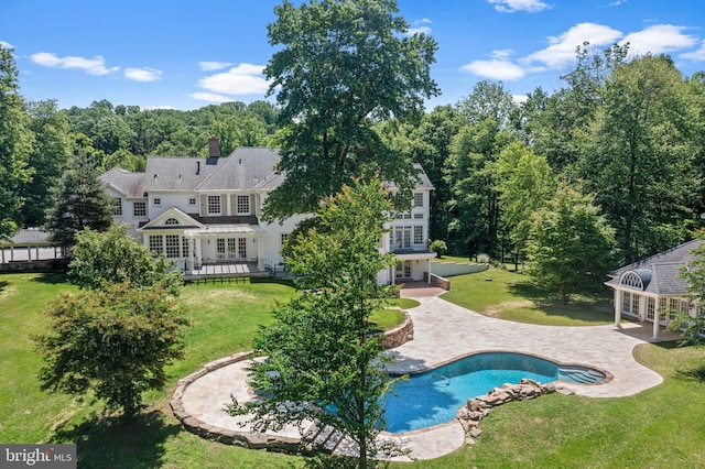 view of pool featuring a gazebo, a yard, and a patio