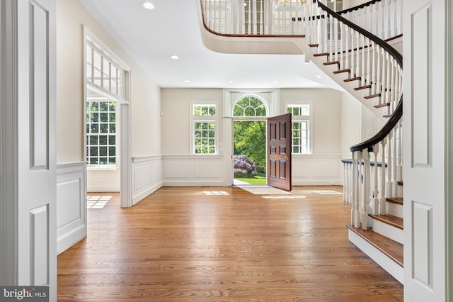 foyer entrance with light wood-type flooring