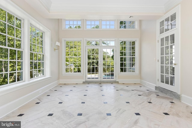 unfurnished sunroom with french doors