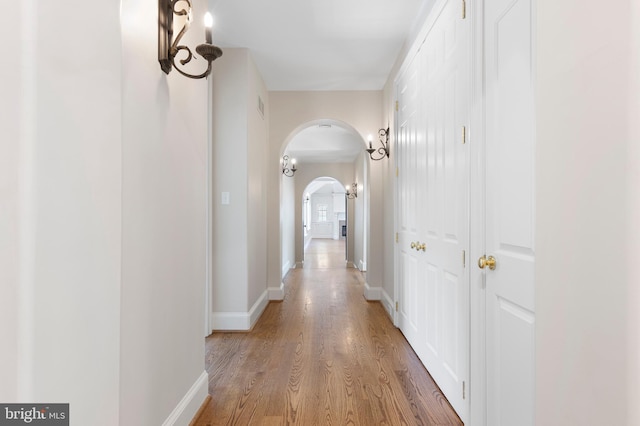 corridor featuring light hardwood / wood-style flooring