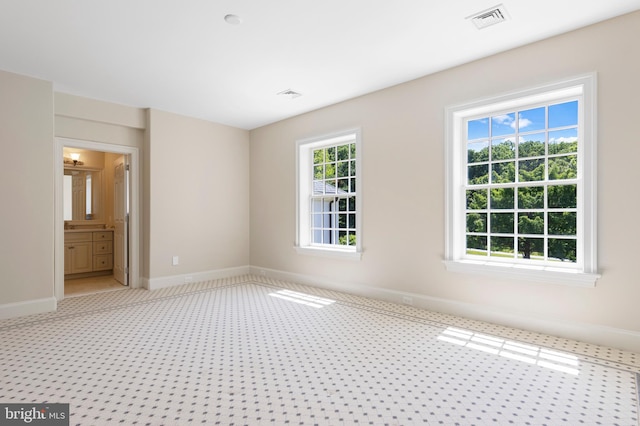 empty room with a healthy amount of sunlight