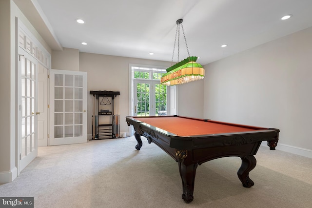 game room featuring light colored carpet, pool table, and french doors