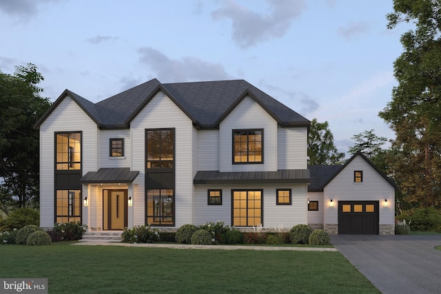 modern inspired farmhouse featuring a front lawn