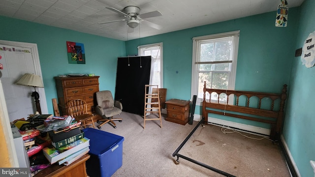 bedroom with ceiling fan and carpet