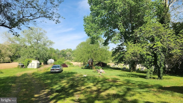 view of yard featuring a playground