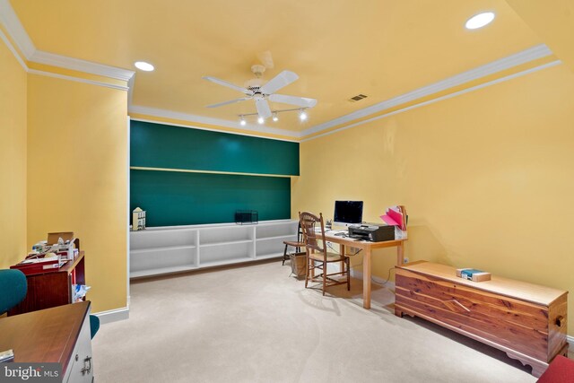 home office featuring ceiling fan, carpet floors, and ornamental molding