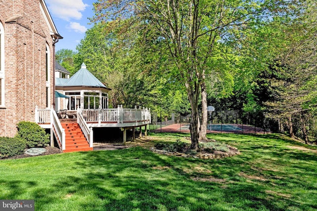 view of yard with a wooden deck