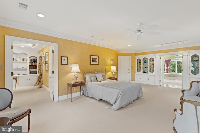 bedroom with light carpet, ceiling fan, and ornamental molding