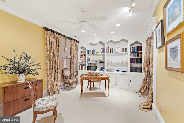 interior space with crown molding, ceiling fan, and light carpet