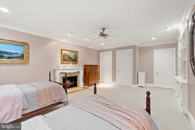 bedroom with ceiling fan, light colored carpet, and ornamental molding