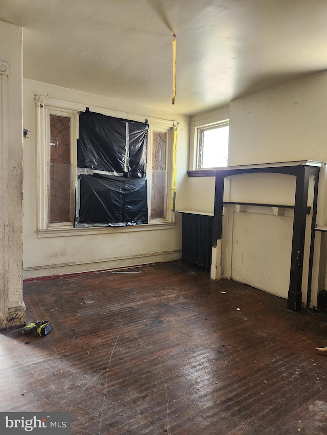 interior space with hardwood / wood-style floors