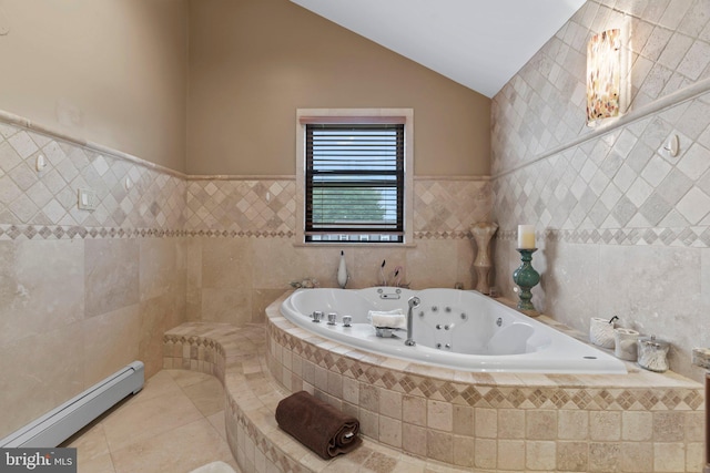 bathroom featuring tile patterned floors, lofted ceiling, tile walls, baseboard heating, and tiled tub