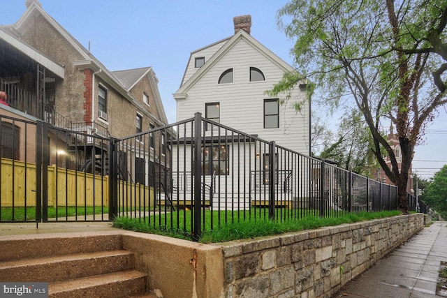 exterior space featuring a front lawn