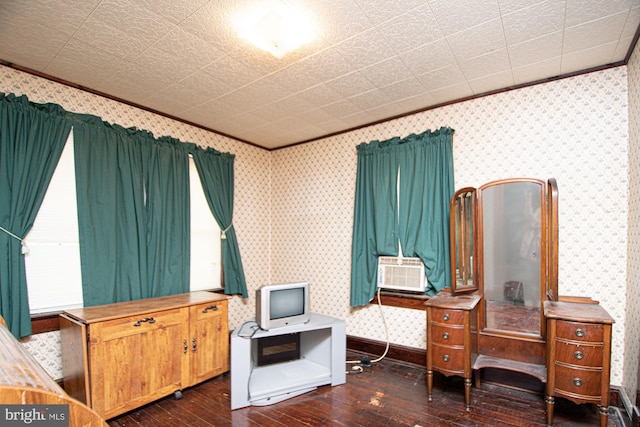 office space featuring dark hardwood / wood-style floors and crown molding