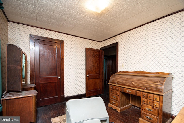 office area featuring dark wood-type flooring and ornamental molding