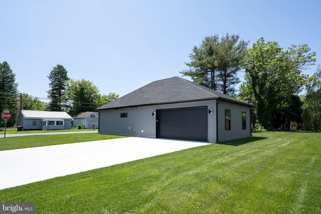 garage with a yard