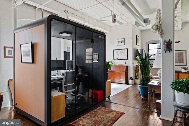 office space featuring ceiling fan and dark wood-type flooring