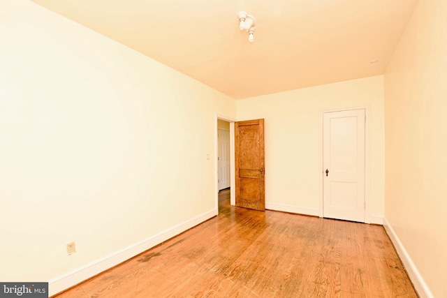 unfurnished room featuring light hardwood / wood-style floors