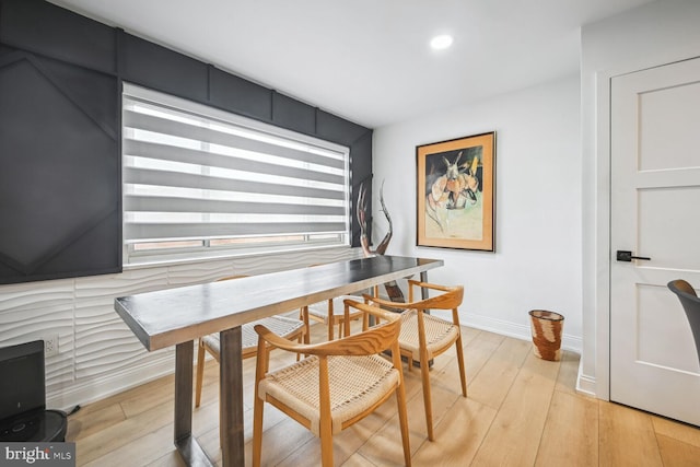 dining space featuring light hardwood / wood-style floors