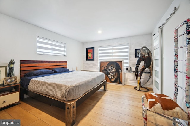 bedroom featuring light wood-type flooring