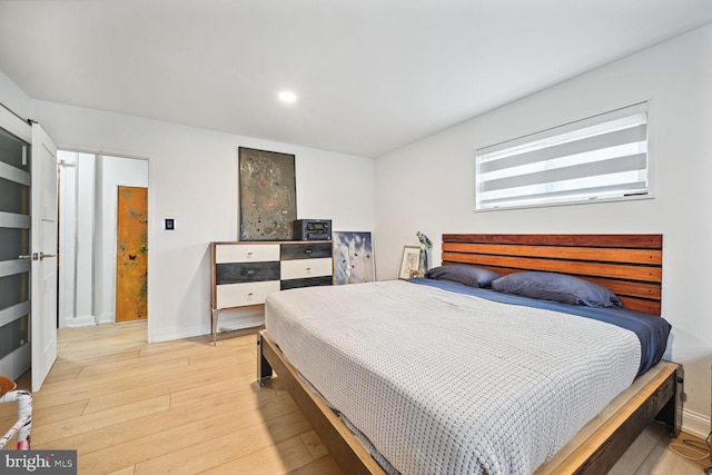 bedroom featuring light hardwood / wood-style flooring