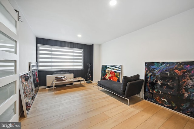 living area with light hardwood / wood-style floors