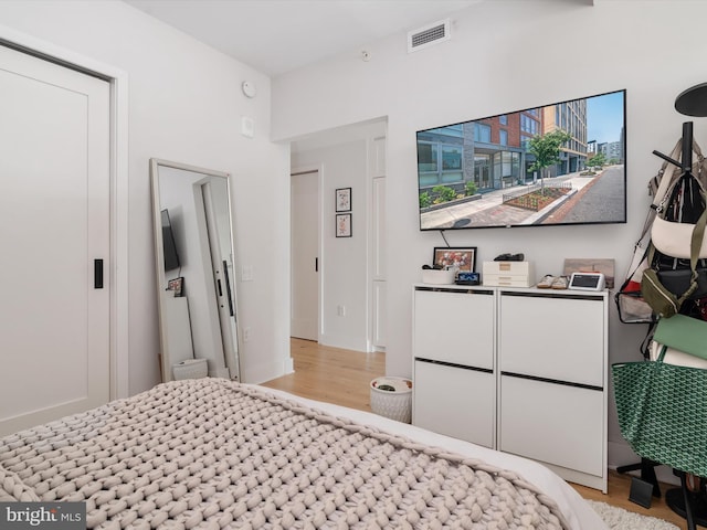 bedroom featuring light wood-type flooring