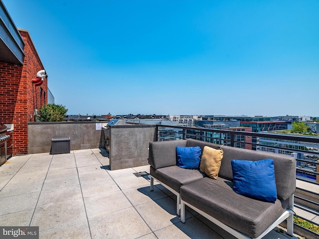 view of patio / terrace with a balcony