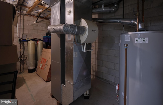 utility room featuring heating utilities and gas water heater