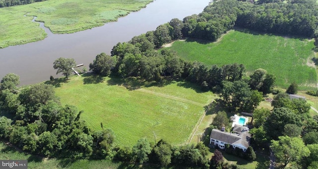 aerial view with a rural view and a water view