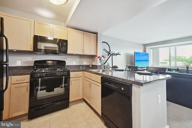 kitchen featuring light colored carpet, black appliances, light brown cabinetry, and kitchen peninsula