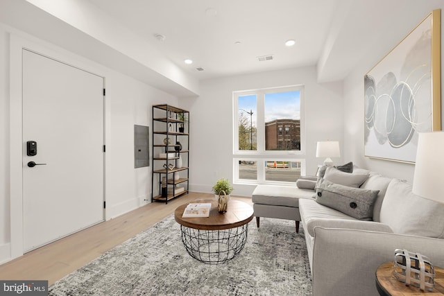 living room with light hardwood / wood-style flooring