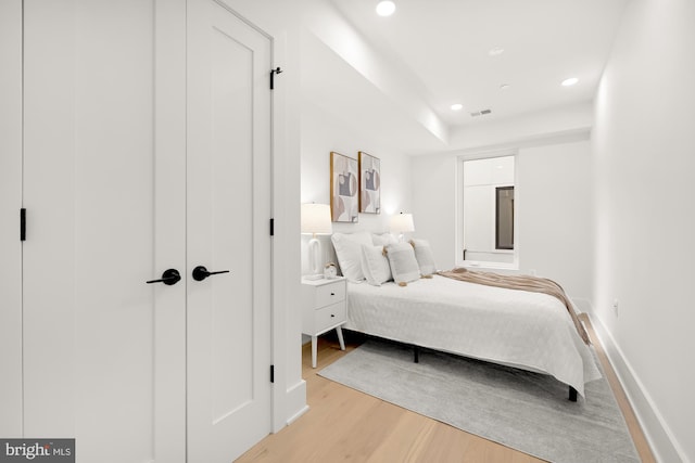 bedroom featuring light hardwood / wood-style flooring