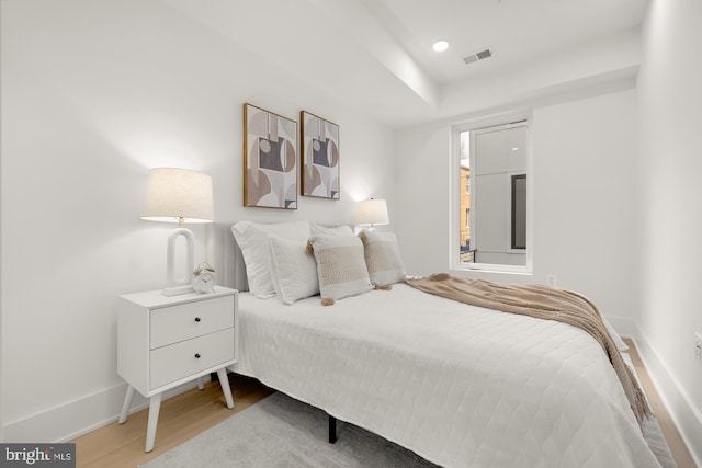 bedroom with light wood-type flooring