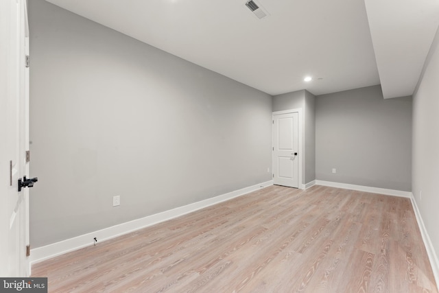 empty room with light wood-type flooring