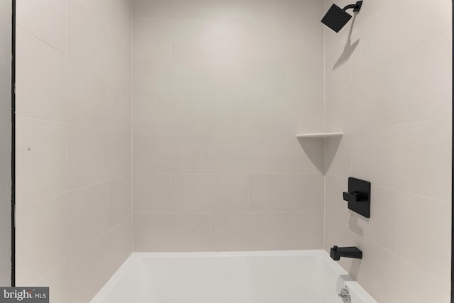 details with tiled shower / bath combo