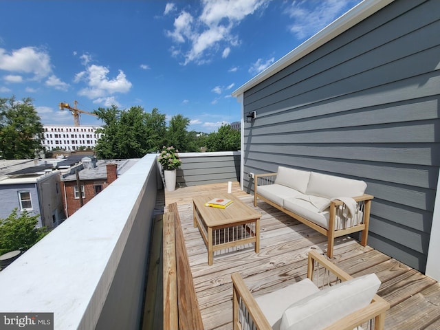 wooden deck featuring an outdoor living space