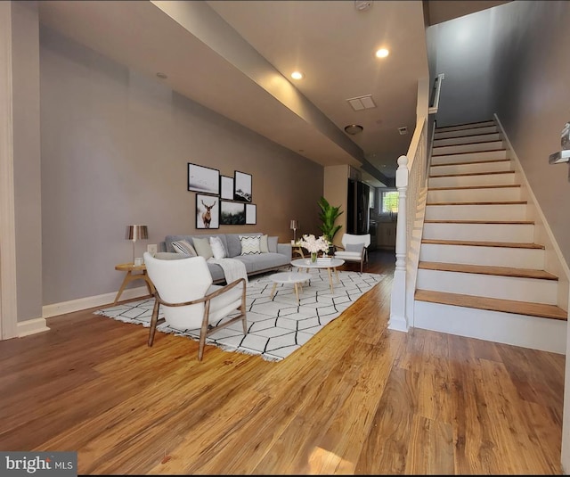 living room with hardwood / wood-style floors