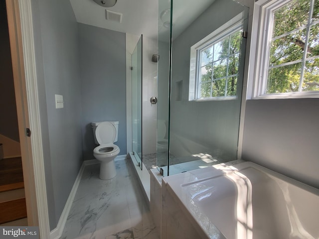 bathroom featuring tile floors, toilet, and plus walk in shower