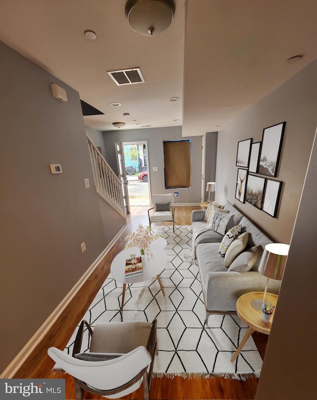 living room with wood-type flooring