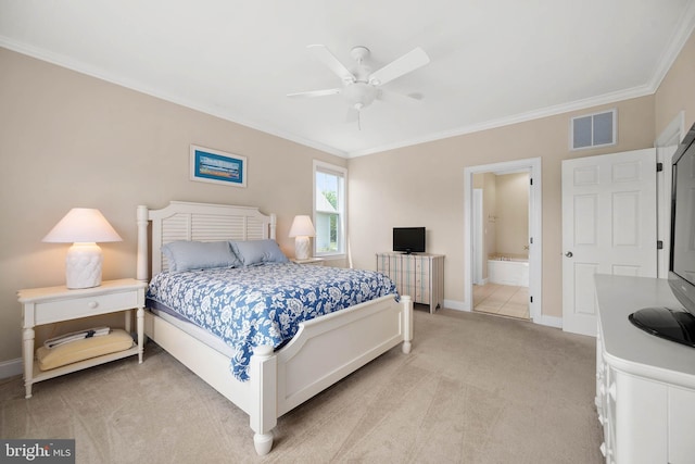 carpeted bedroom with ensuite bathroom, ornamental molding, and ceiling fan