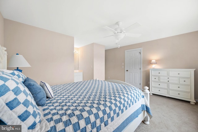 bedroom with light colored carpet and ceiling fan