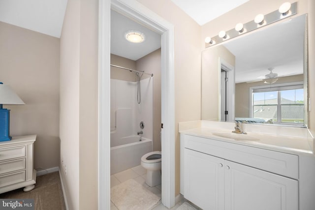 full bathroom with tile patterned floors, toilet, bathtub / shower combination, vanity, and ceiling fan