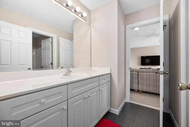 bathroom featuring vanity and ceiling fan