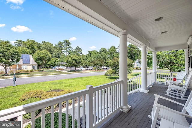 deck featuring covered porch