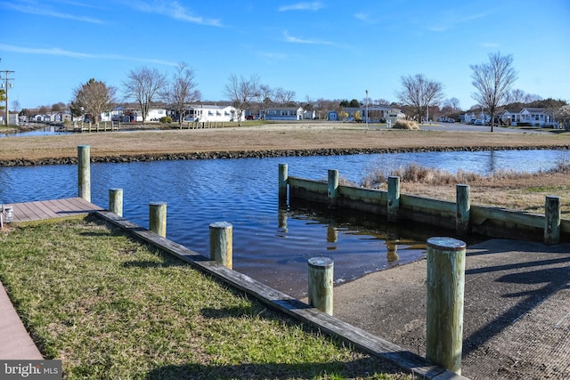 dock area with a water view